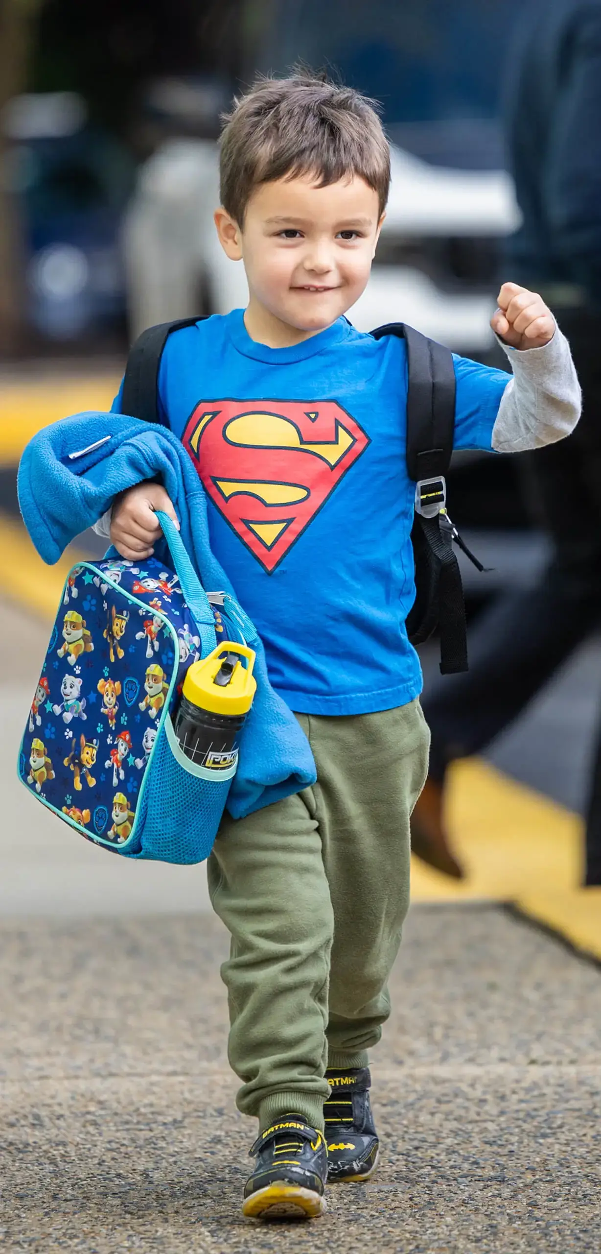 little boy in superman t-shirt