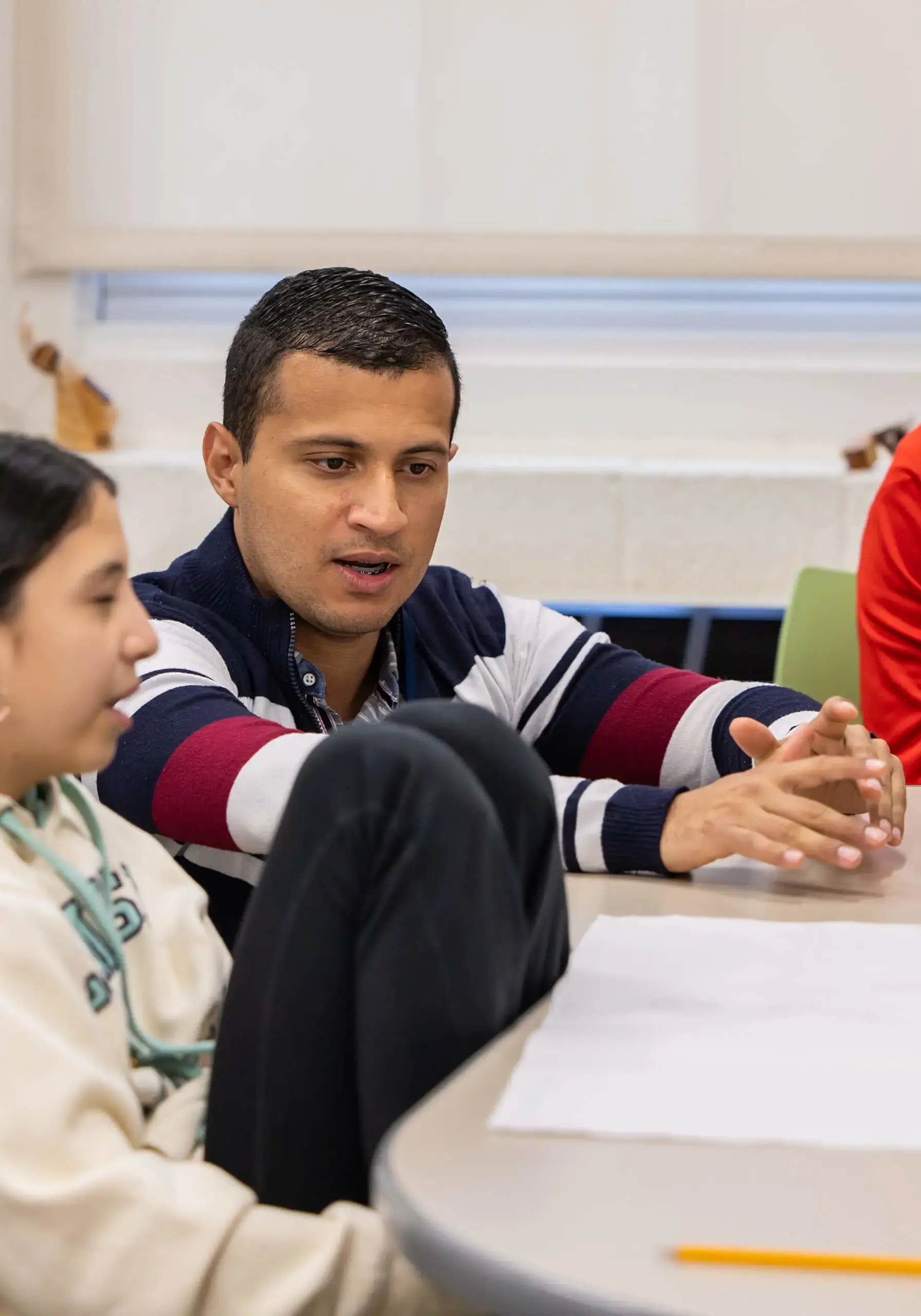 Teacher working with pupils