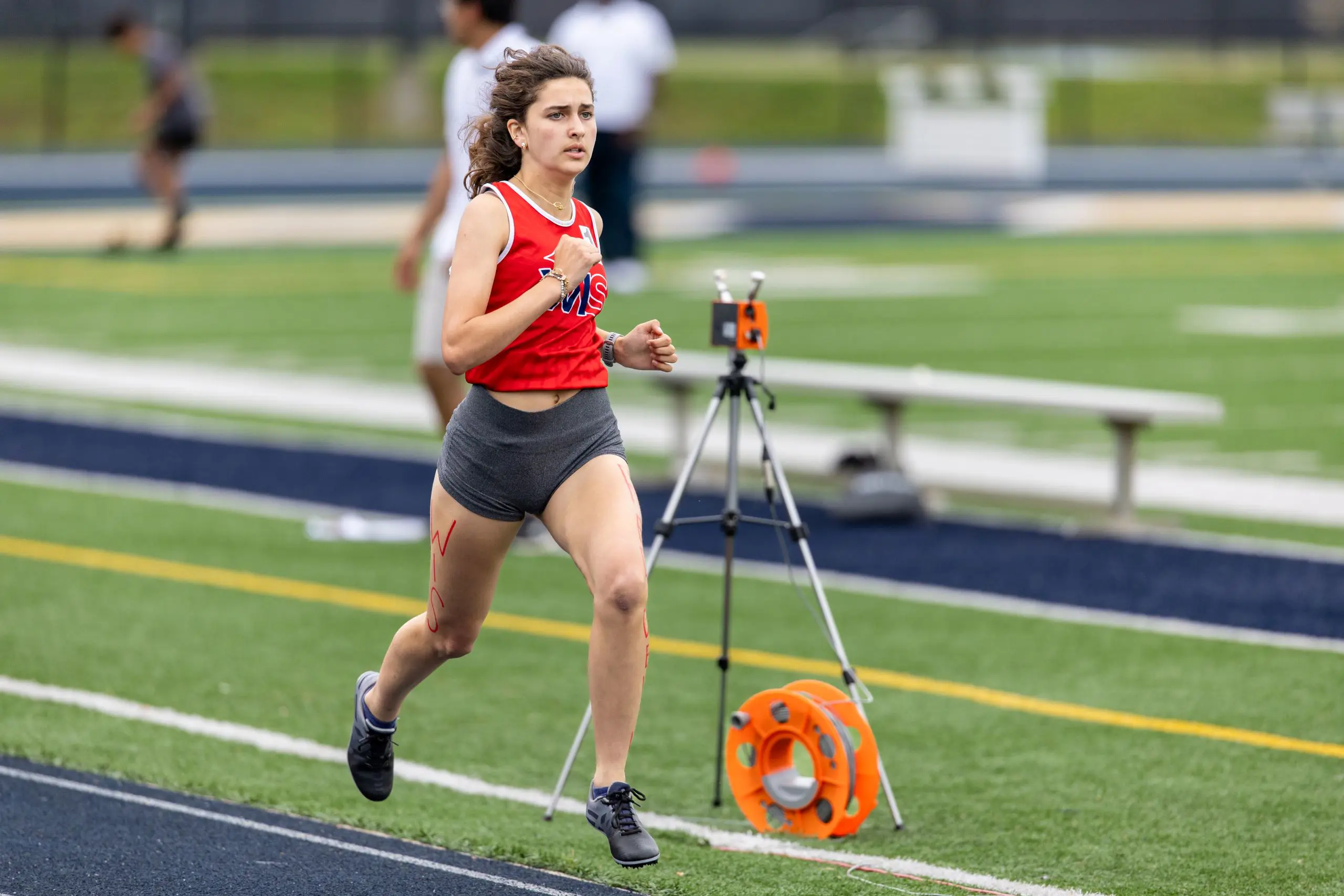 Athlete running on track