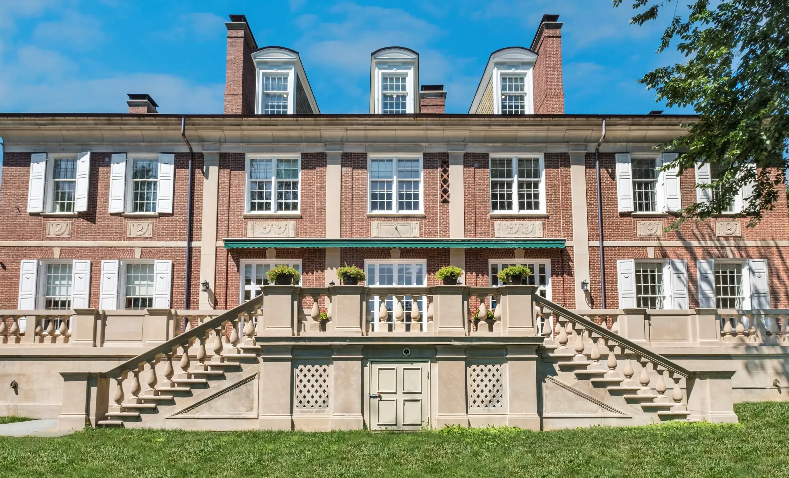 Mansion with grass foreground