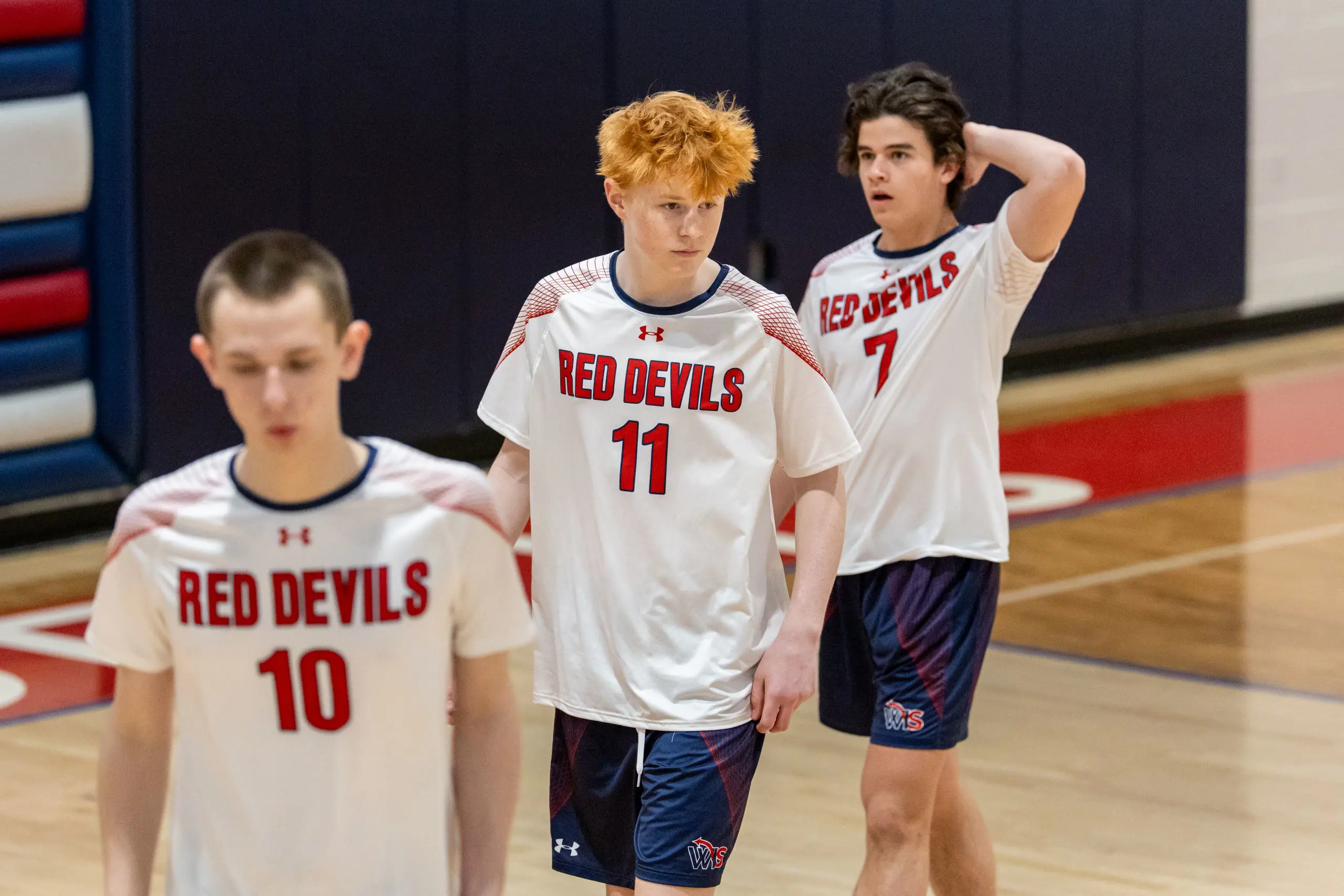 Student athletes on volleyball court