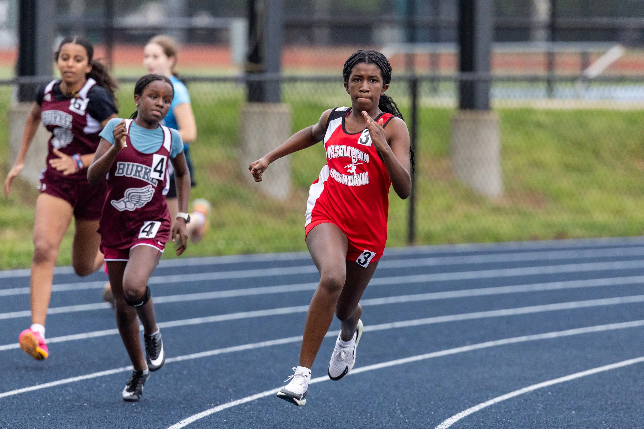 Athlete running on track