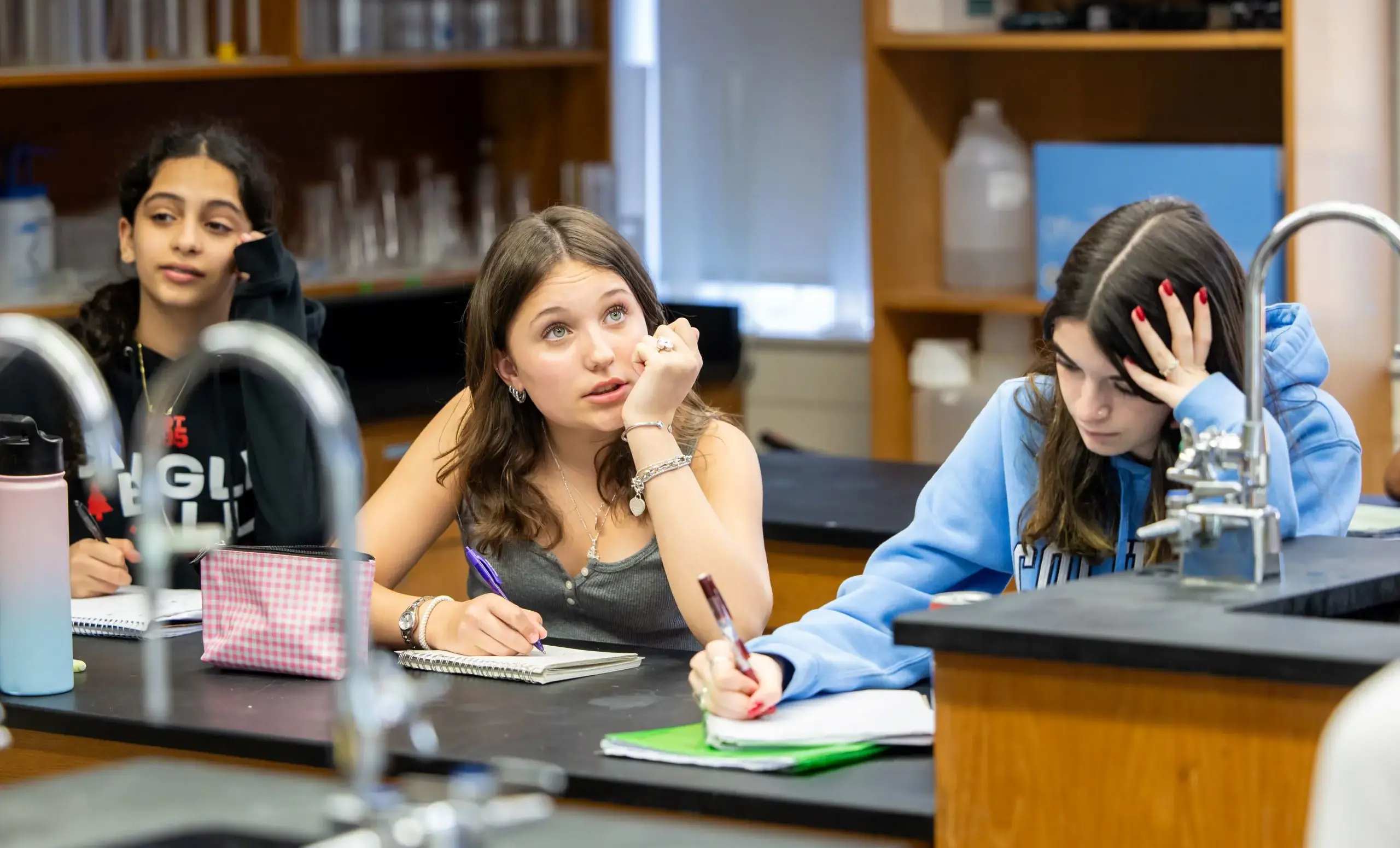 Students taking notes in class