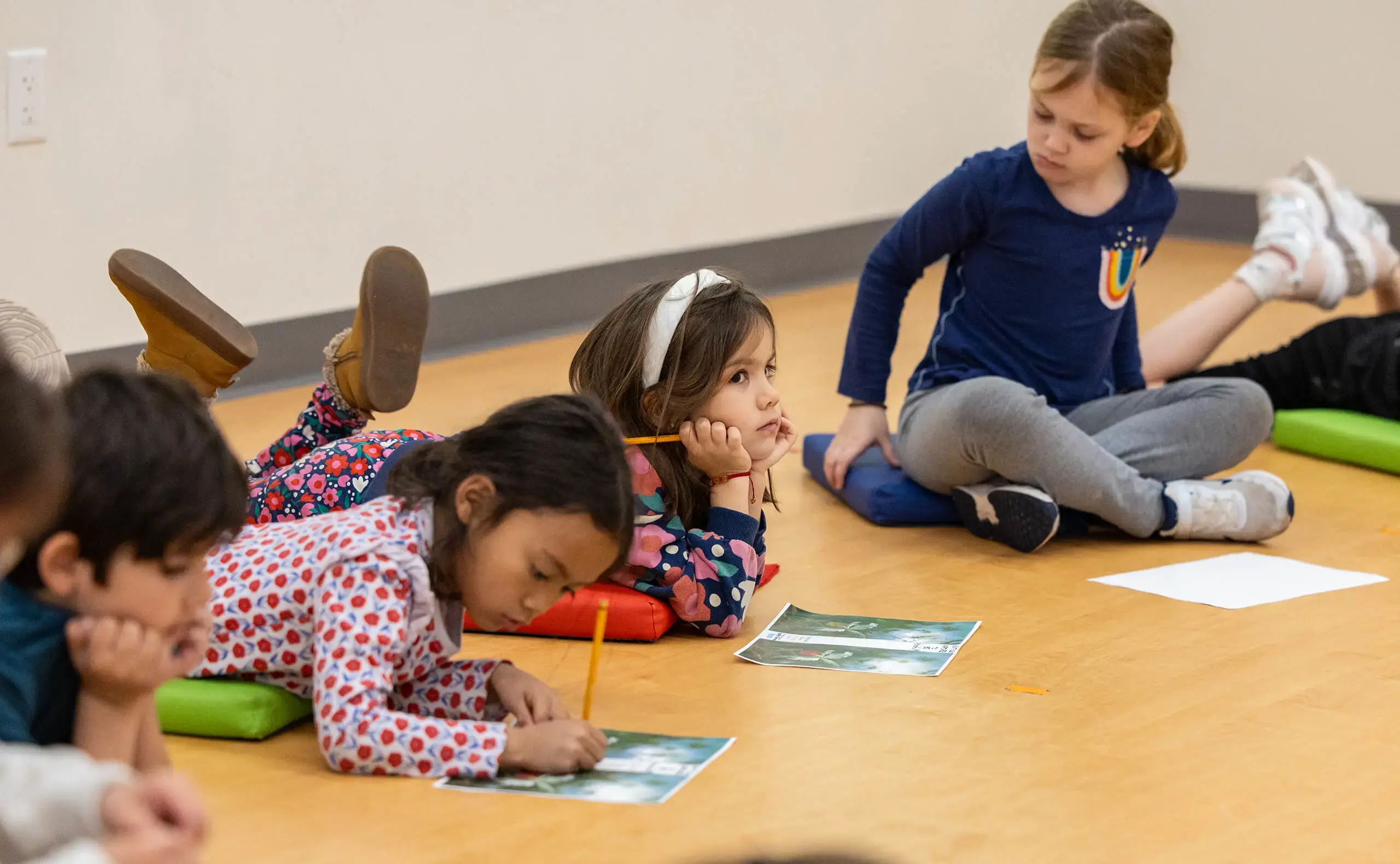 Kids working on PS movement room floor