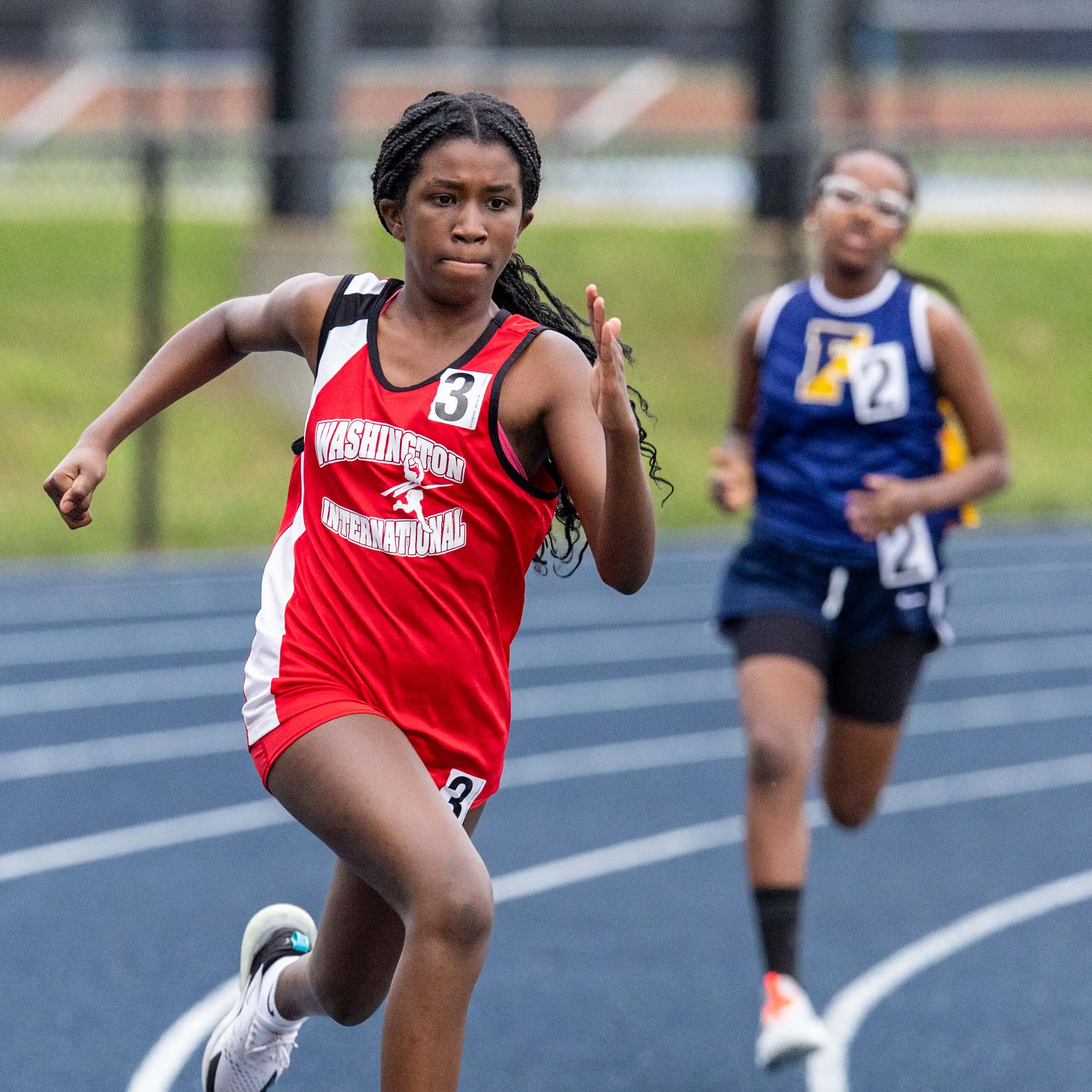 girl running on a track