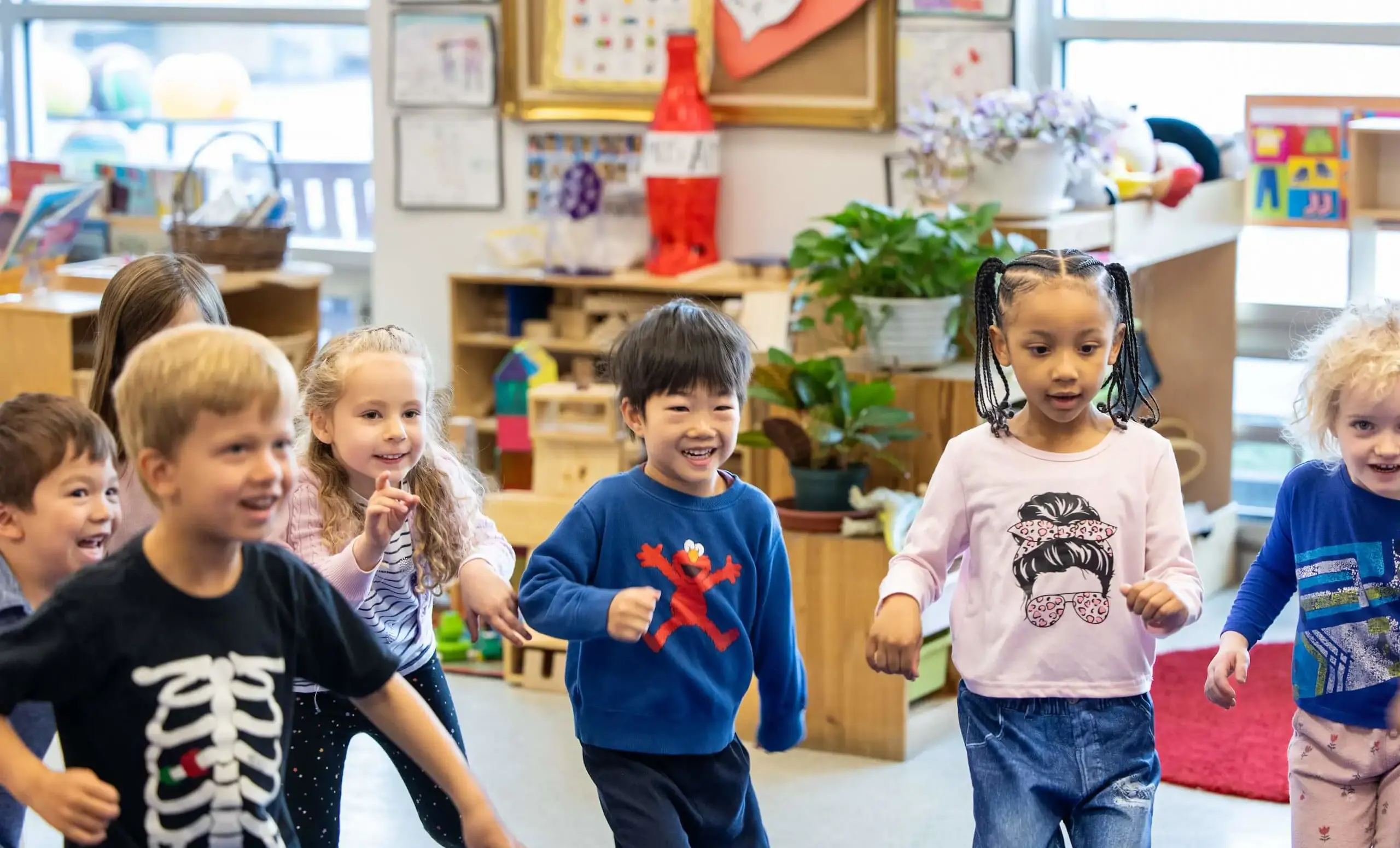 Children playing a game in a classroom