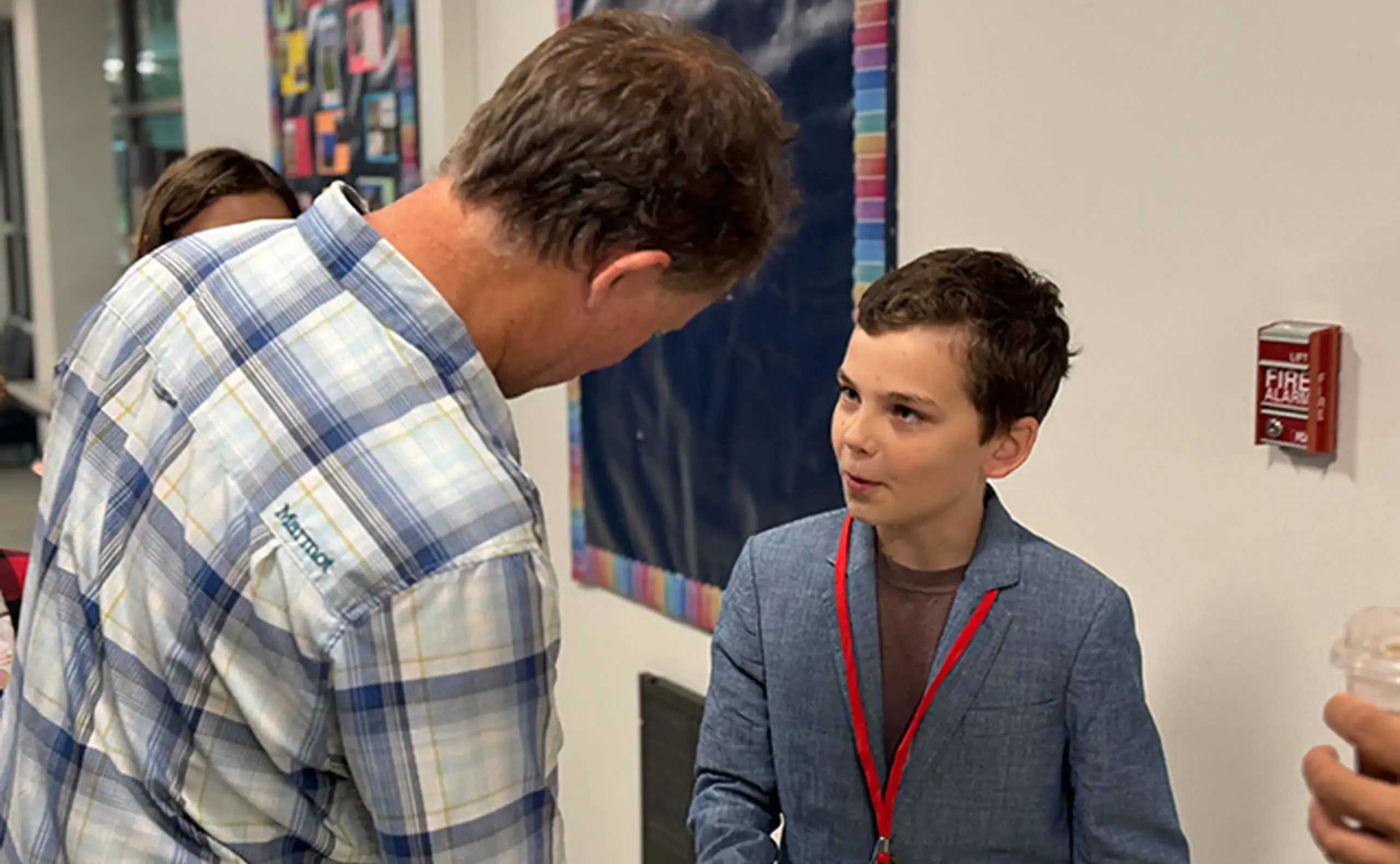 Primary school student acting as principal for the day