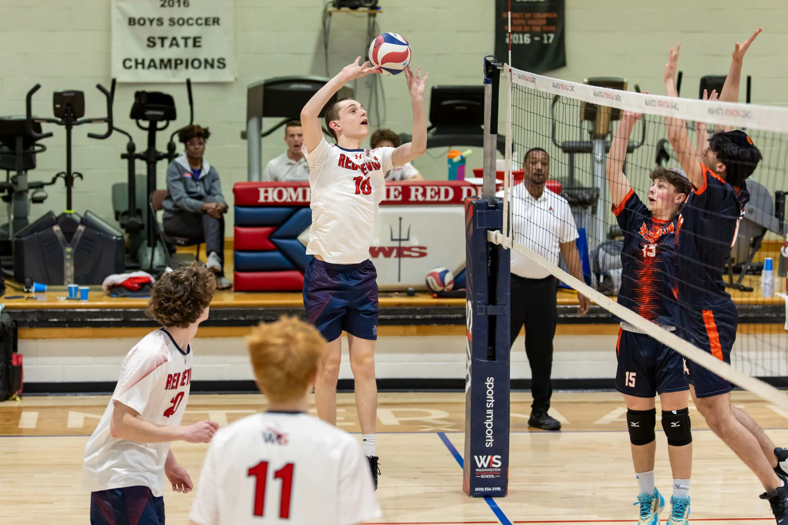 Student athletes playing volleyball